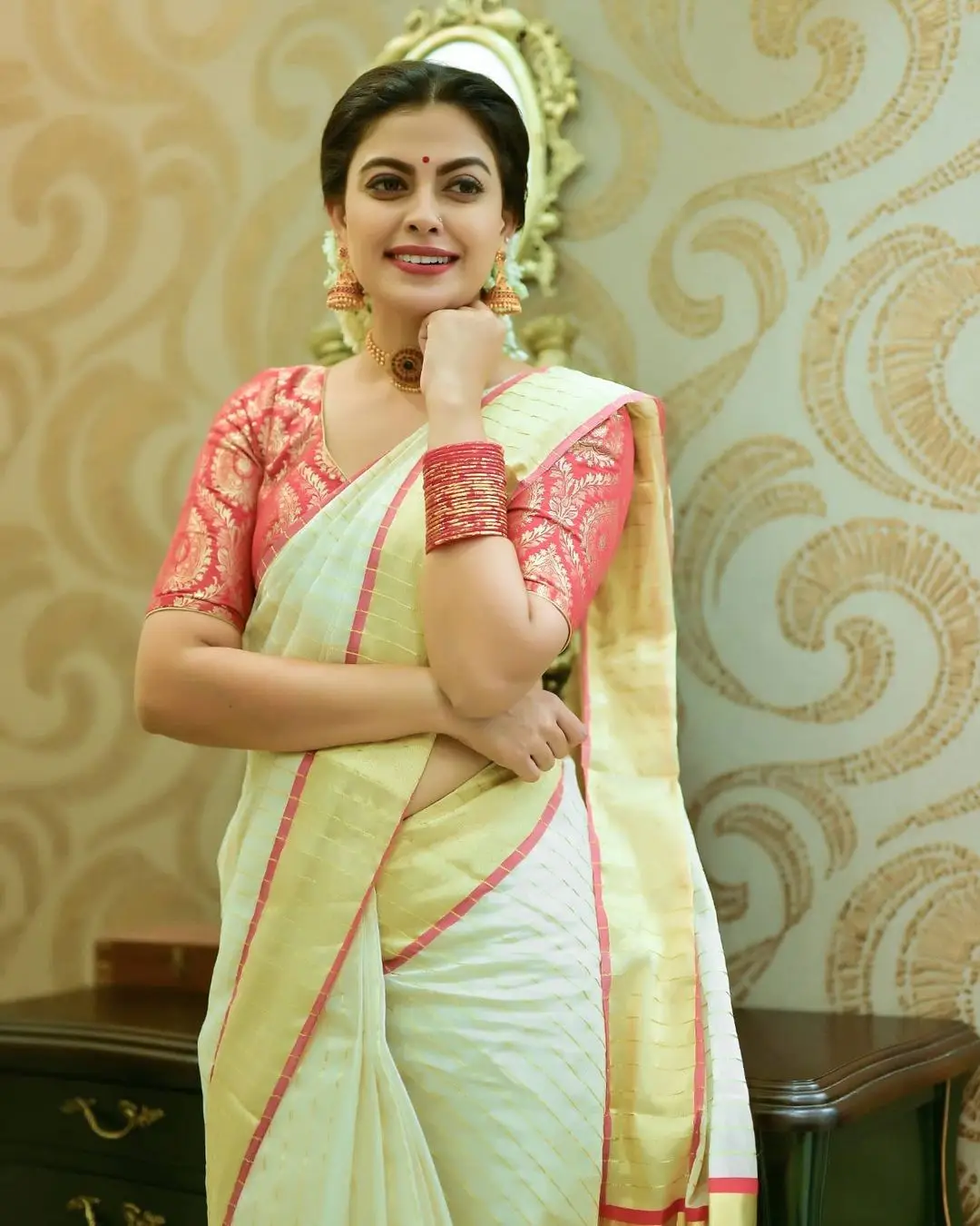 indian actress anusree nair in light green color saree red blouse